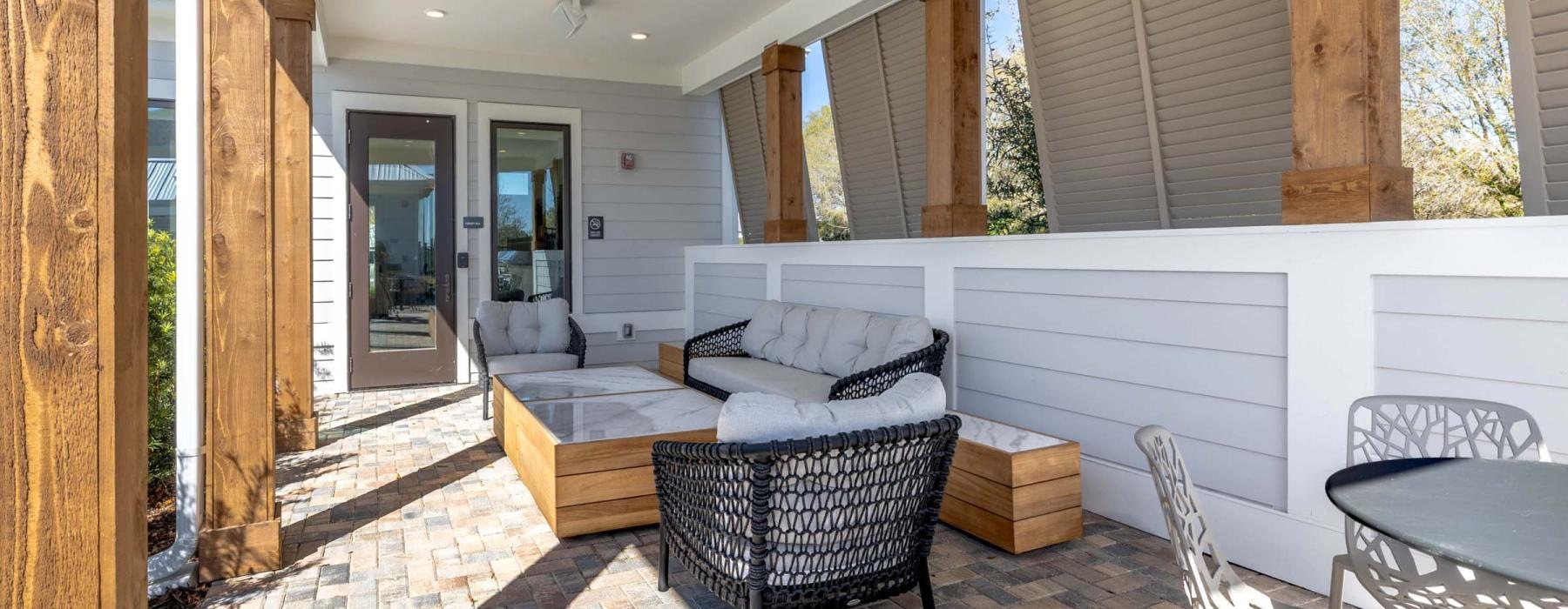 a living room with a couch and chairs