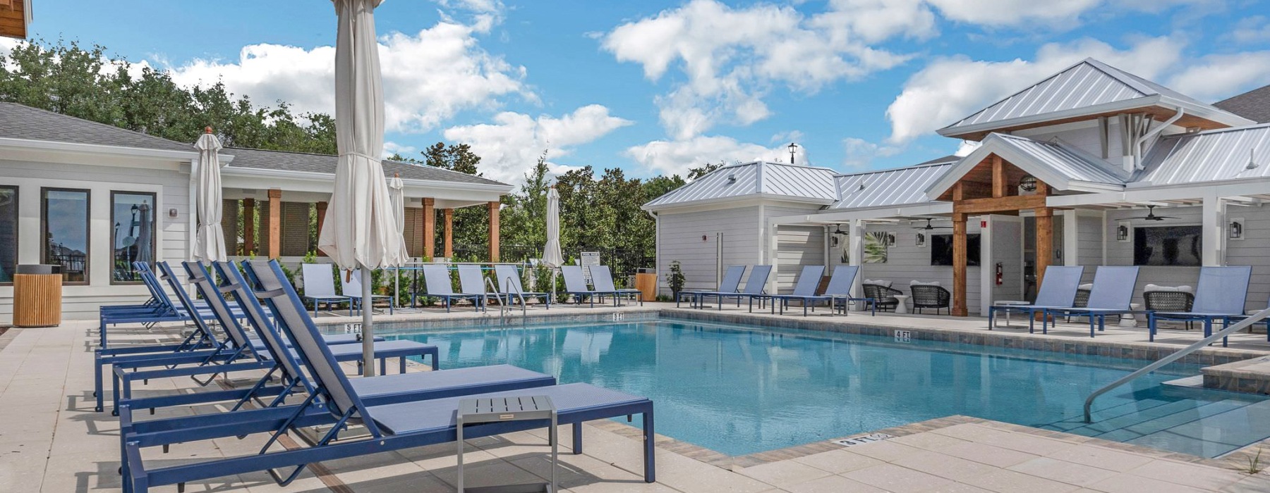 pool with lounge chairs