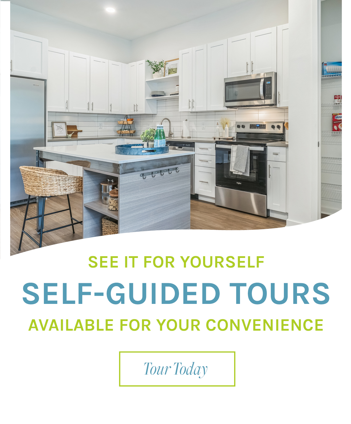 Modern kitchen with white cabinets and stainless steel appliances, promoting self-guided tours for convenience.